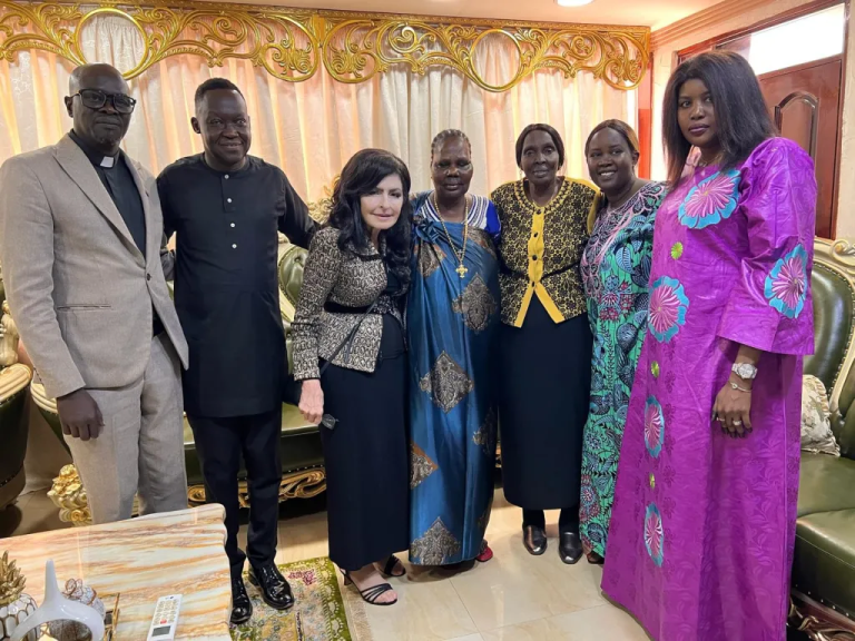 Dr. Michelle Corral with South Sudan leaders and clergy